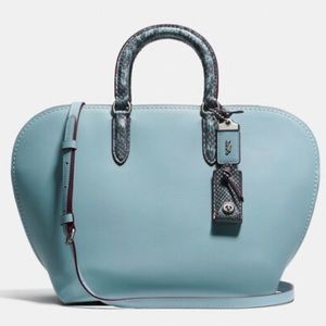 Coach Dakotah snake skin bag $500